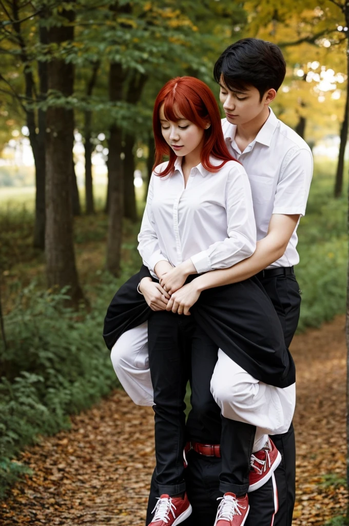Red-haired girl and black-haired boy, both of them on their backs