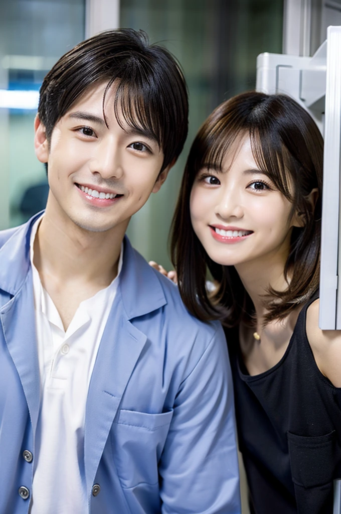 dentist　Male and female２people　全員くろ色の医療スクラブ着用 日本people 黒髪 20代後半　Main upper body　smile　Photo shoot in the hospital　　No accessories included　Black
