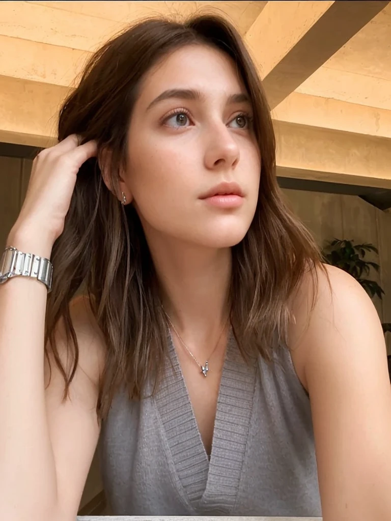 realistic photography, 3d, detailed. beautiful young woman, fresh clean face, sitting against the background of modern architecture. Her shoulder-length hair is bright black and neatly flowing. wearing a gray sleeveless top with knit v-neck detail. wearing a simple necklace with an "H" pendant and a metal watch on his left wrist. The position of his left hand is holding his hair near his ear, giving the impression of a natural and relaxed style with a calm expression and eyes that look far away as if he is contemplating. The backdrop features natural lighting coming in from large windows, creating shadows and soft light on the walls and ceiling. 124k, Hyper realistic, HD.