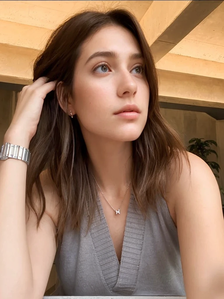 realistic photography, 3d, detailed.  beautiful young woman, fresh clean face, sitting against the background of modern architecture.   Her shoulder-length hair is bright black and neatly flowing.  wearing a gray sleeveless top with knit v-neck detail.  wearing a simple necklace with an "H" pendant and a metal watch on his left wrist.  The position of his left hand is holding his hair near his ear, giving the impression of a natural and relaxed style with a calm expression and eyes that look far away as if he is contemplating.  The backdrop features natural lighting coming in from large windows, creating shadows and soft light on the walls and ceiling.  124k, Hyper realistic, HD.