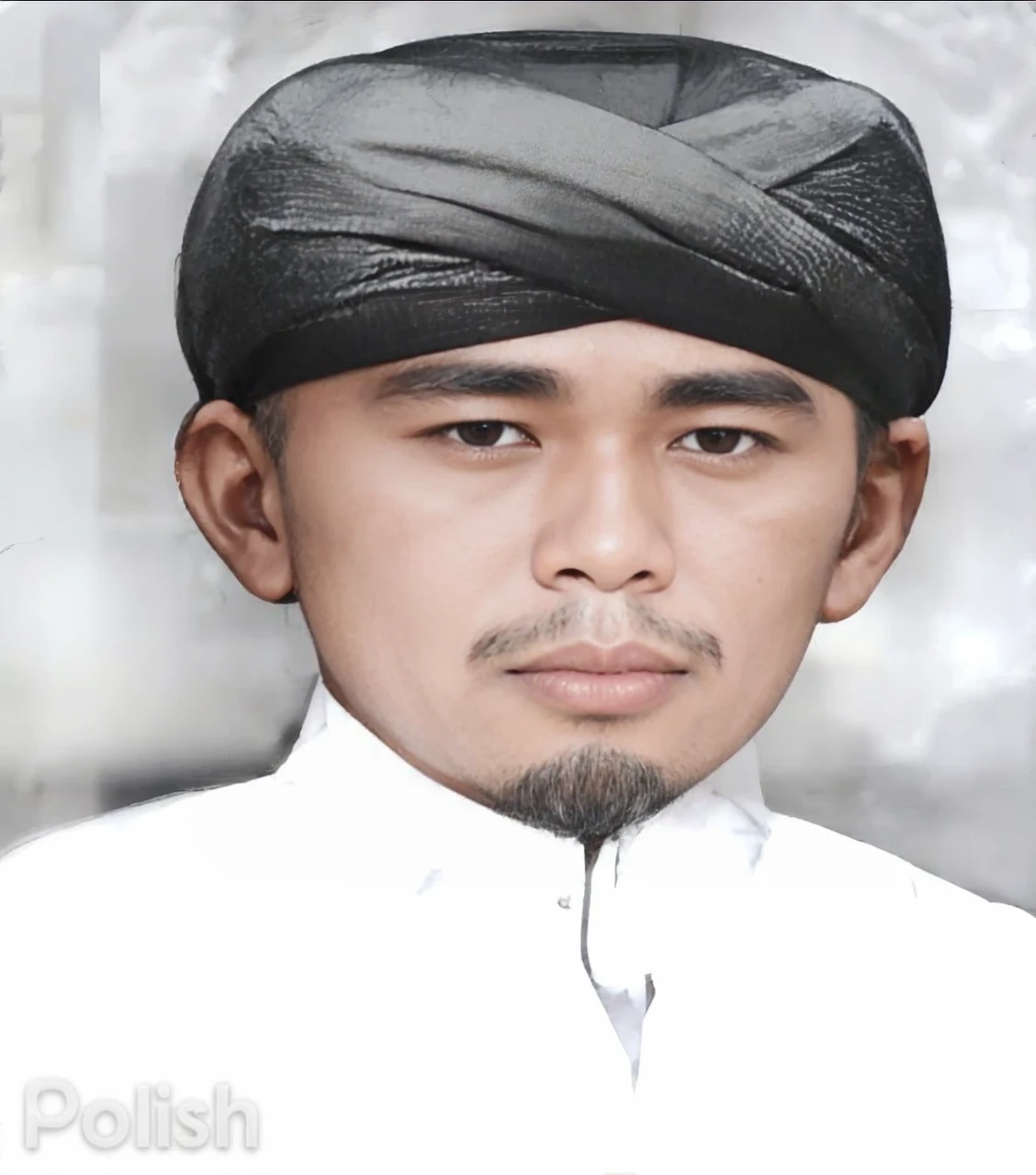 Indonesian Muslim man, 39 years old, natural brown skin, slightly wrinkled, wearing a black head covering, clean white Islamic clothes, thick slightly long eyebrows, slightly slanted eyes, not too high nose, closed mouth, oval face shape, has a mustache thin and beard, HD quality realistic images.