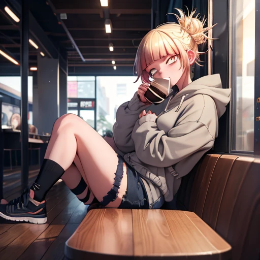 Himiko Toga, anime character from My Hero Academia, wearing an oversized grey hoodie, ripped denim shorts, and black sandals. She is sitting at a modern café table near the window, drinking a cappuccino with a thoughtful expression. The café has a cozy atmosphere with wooden furniture and soft lighting. [style: anime, background: café, pose: sitting, expression: thoughtful, lighting: soft]