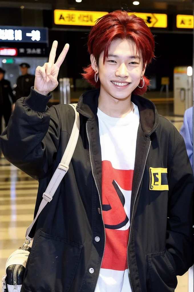 An Indonesian Malaysian boy has a big smile on his face, while standing at the airport and being photographed by paparazzi. He has a modern clothing style, black hair, world, yes also well styled he has dimples he is tall and waves short hair