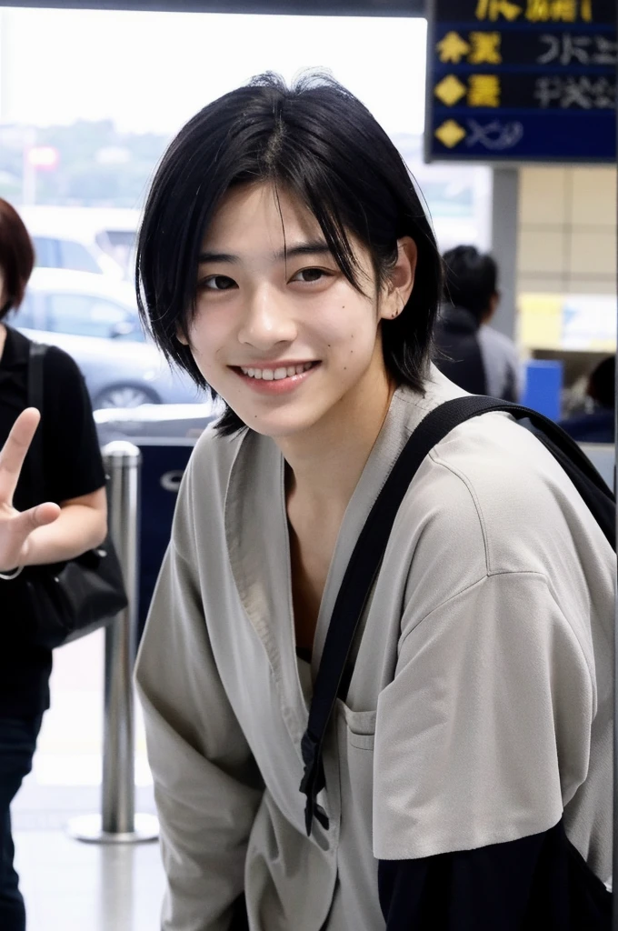 An Indonesian Malaysian boy has a big smile on his face, while standing at the airport and being photographed by paparazzi. He has a modern clothing style, black hair, world, yes also well styled he has dimples he is tall and waves short hair