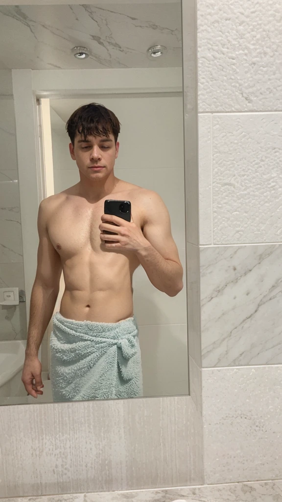 do not modify anything in the photo. make his penis visible under the towel, a lump. don&#39;t change face, body or background. just change the penis