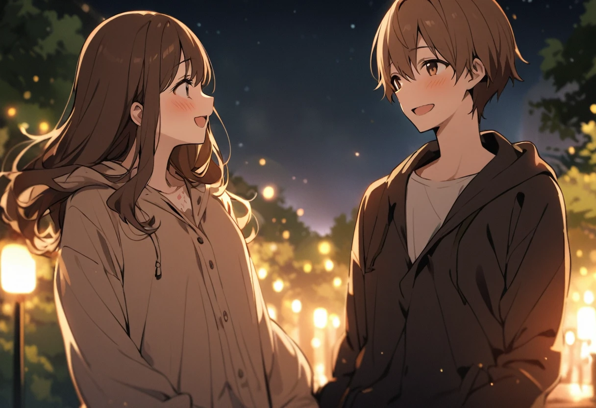 A couple looking at each other and laughing in a park at night、Woman has long brown hair