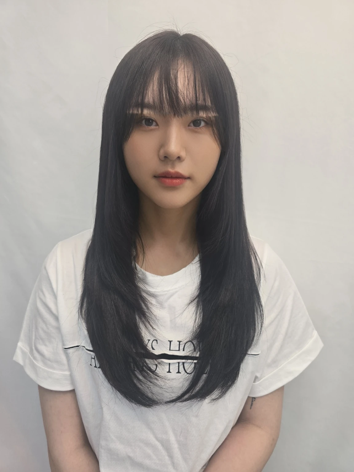 Best Quality, 8k, Masterpiece, (Portrait: 1.3), (photo realistic:1.4), (hyper realistic:1.4), Sharp Focus, looking at viewer, (smoother lighting:1.1), (increase cinematic lighting quality:0.9), realistic lighting, backlighting, light on face, ray trace, (brightening light:1.2), (Increase quality:1.4), sharp detail, (best quality real texture skin:1.4), finely detailed eyes, black_eyes, finely detailed face, 25 year old Korean woman, (white formal_shirt:1.4), (Create an image maintaining the original base model hairstyle:1.5)