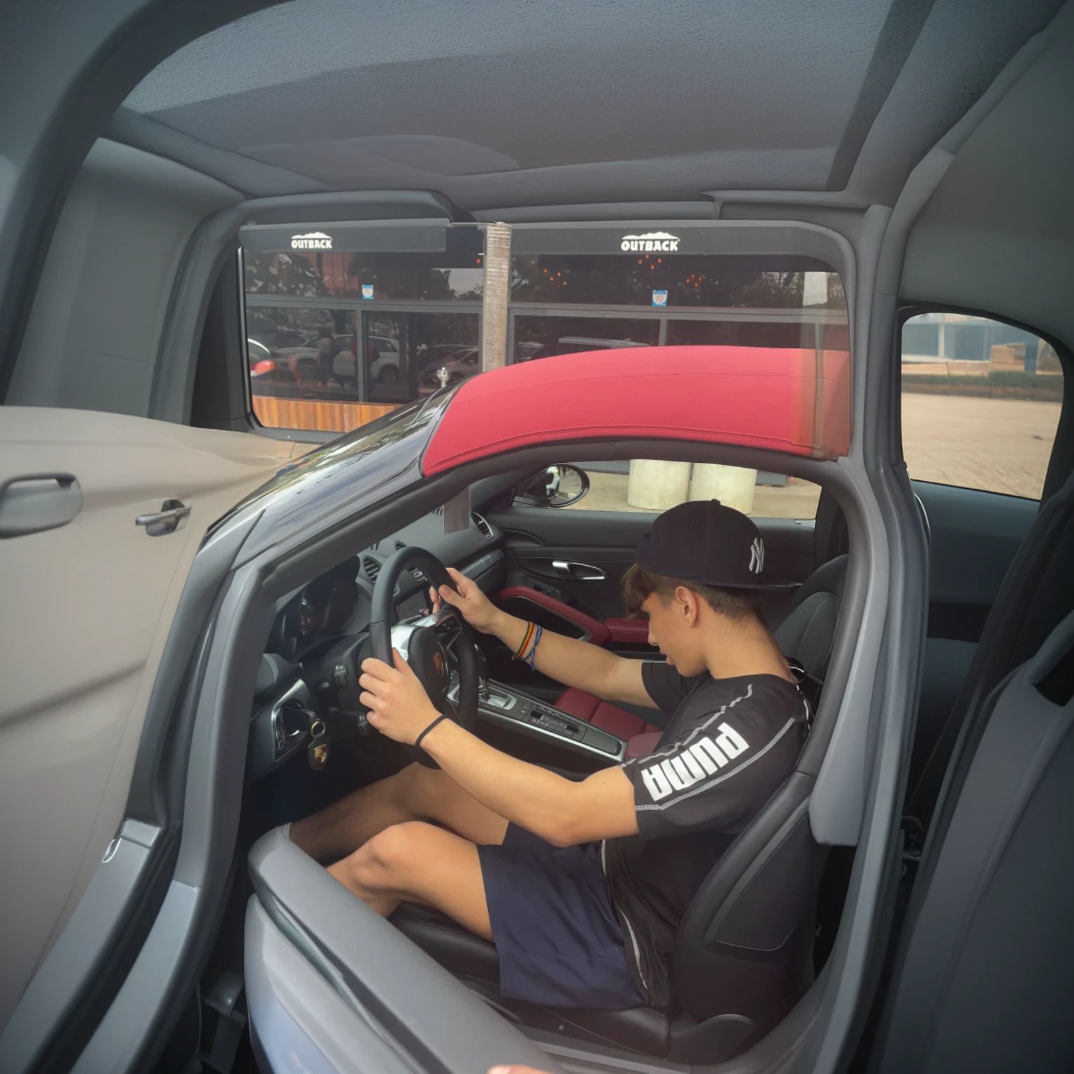 young man inside a car