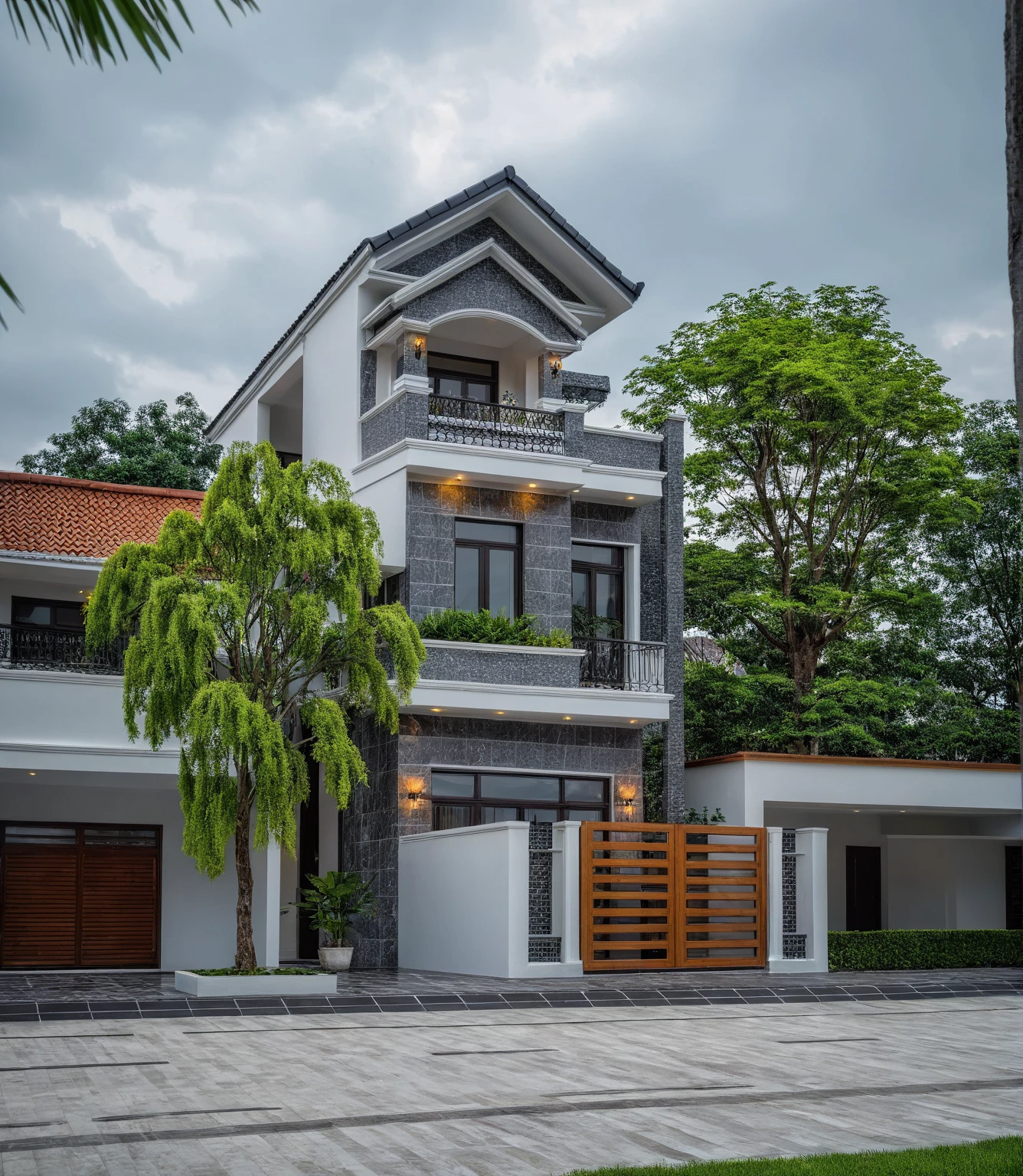 (bright image), A double story modern style house in the middle of Vietnam, (dark grnite tiled wall),(classic detail), simple and elegant architecture with white walls on top half and grey tiles roof, large windows with, entrance door is white with arched shape, bonsai trees, wide tile stone courtyard, professional photography, daylight, natural light, high resolution photography, (best quality, ultra realistic, masterpiece:1.15)