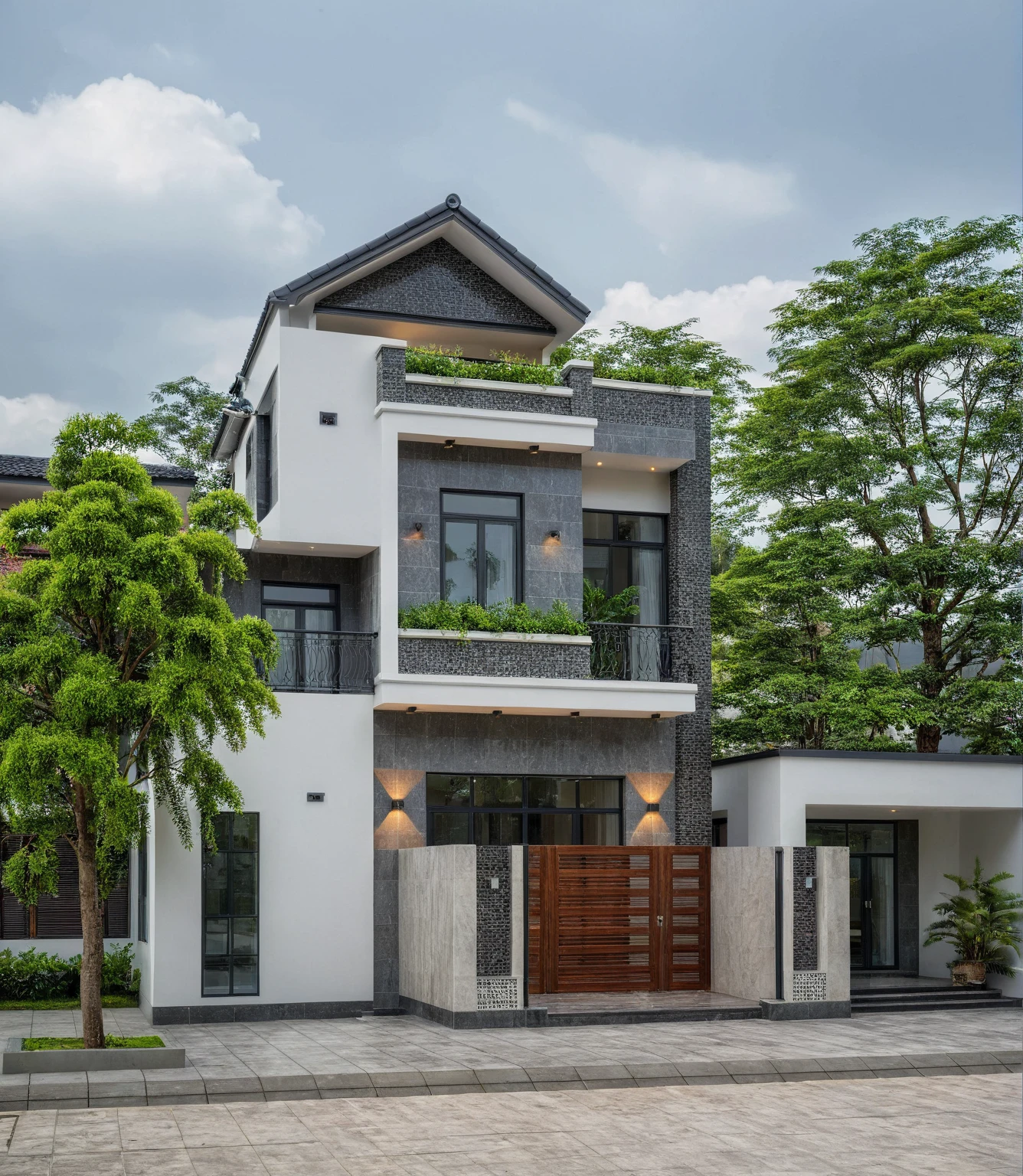 (bright image), A double story modern style house in the middle of Vietnam, (dark grnite tiled wall),(classic detail), simple and elegant architecture with white walls on top half and grey tiles roof, large windows with, entrance door is white with arched shape, bonsai trees, wide tile stone courtyard, professional photography, daylight, natural light, high resolution photography, (best quality, ultra realistic, masterpiece:1.15)