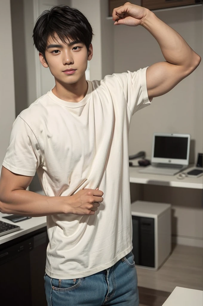 A young Asian man stands, handsome, muscular, looking at the camera. In a plain brown t-shirt, In the computer room