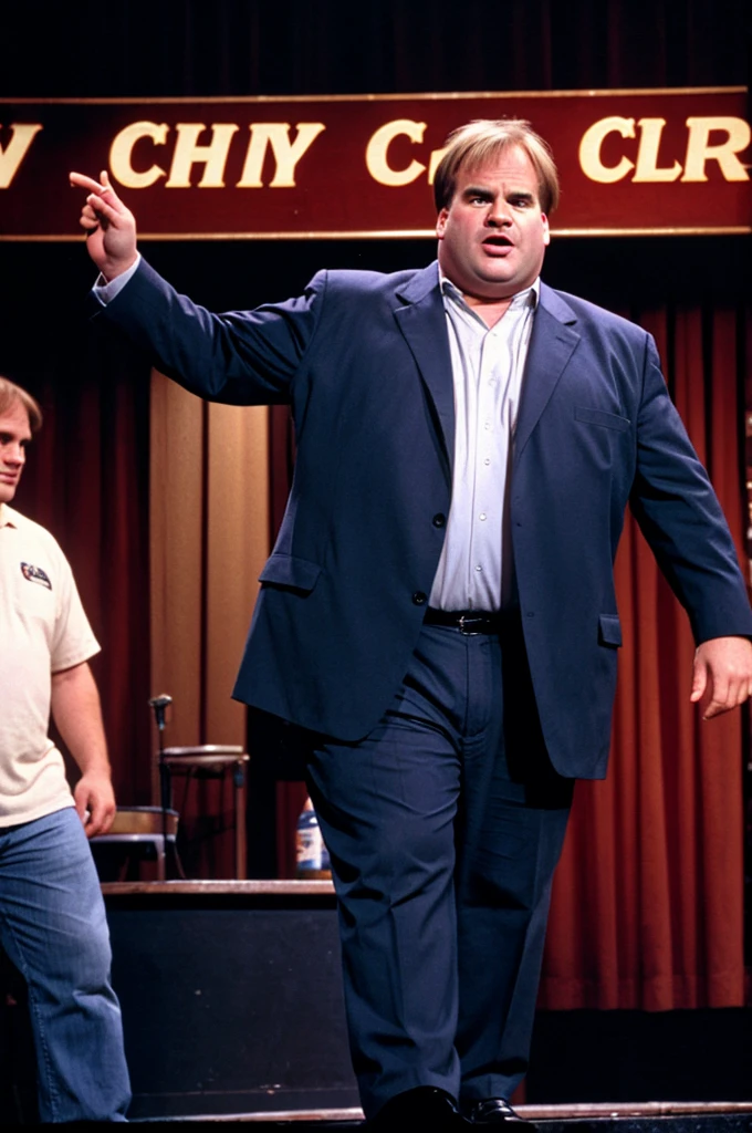 Chris Farley at 43 years old. On stage at a comedy club.
