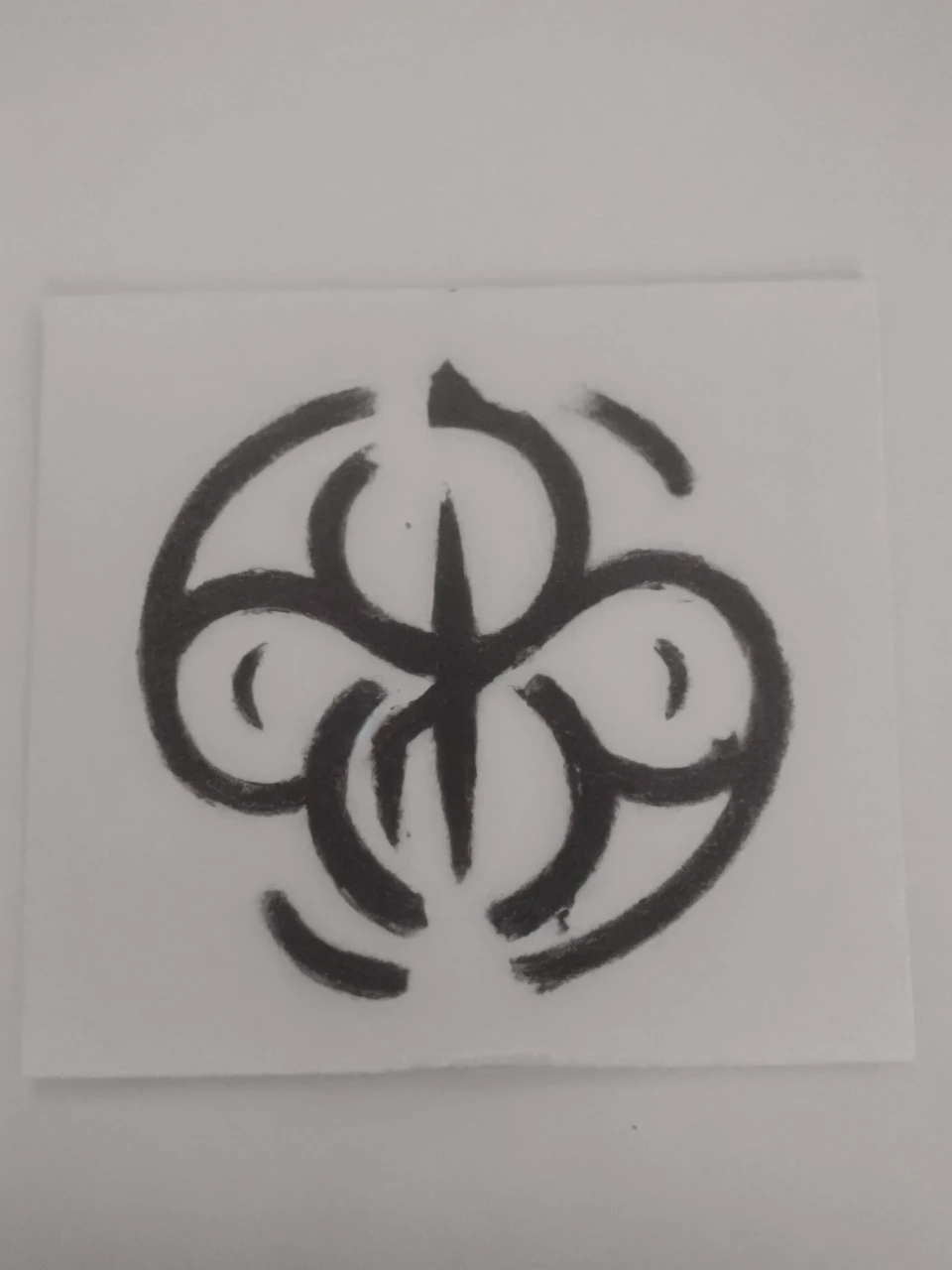 A black symbol with a white background