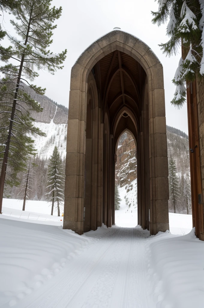 Snowy archway in a mountain valley,