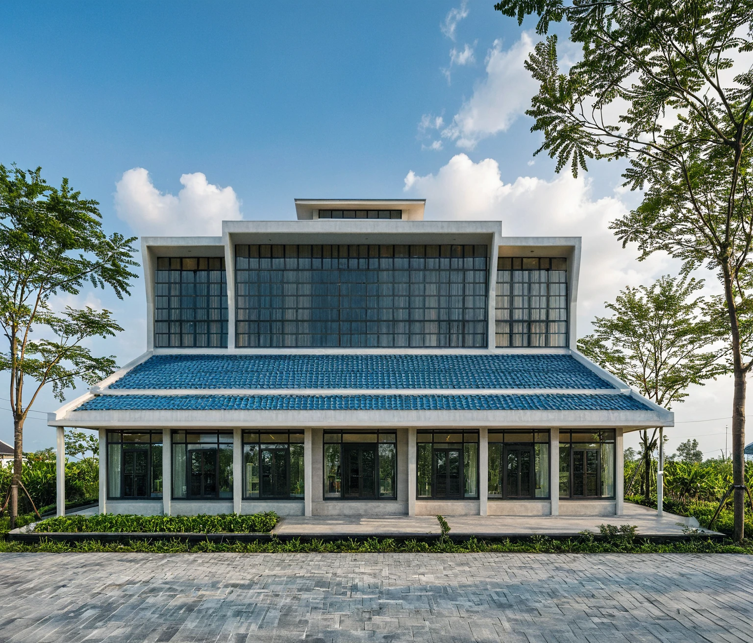 Raw photo, Masterpiece, high quality, best quality, authentic, super detail, outdoors, house style modern on the street , a traditional single-story Thai-style house, large glass window and at the first floor, blue tile roof, white wall, pavement, grass, trees, tropical plants, clear sky, cloud, (nature light), (daylight:1.2)