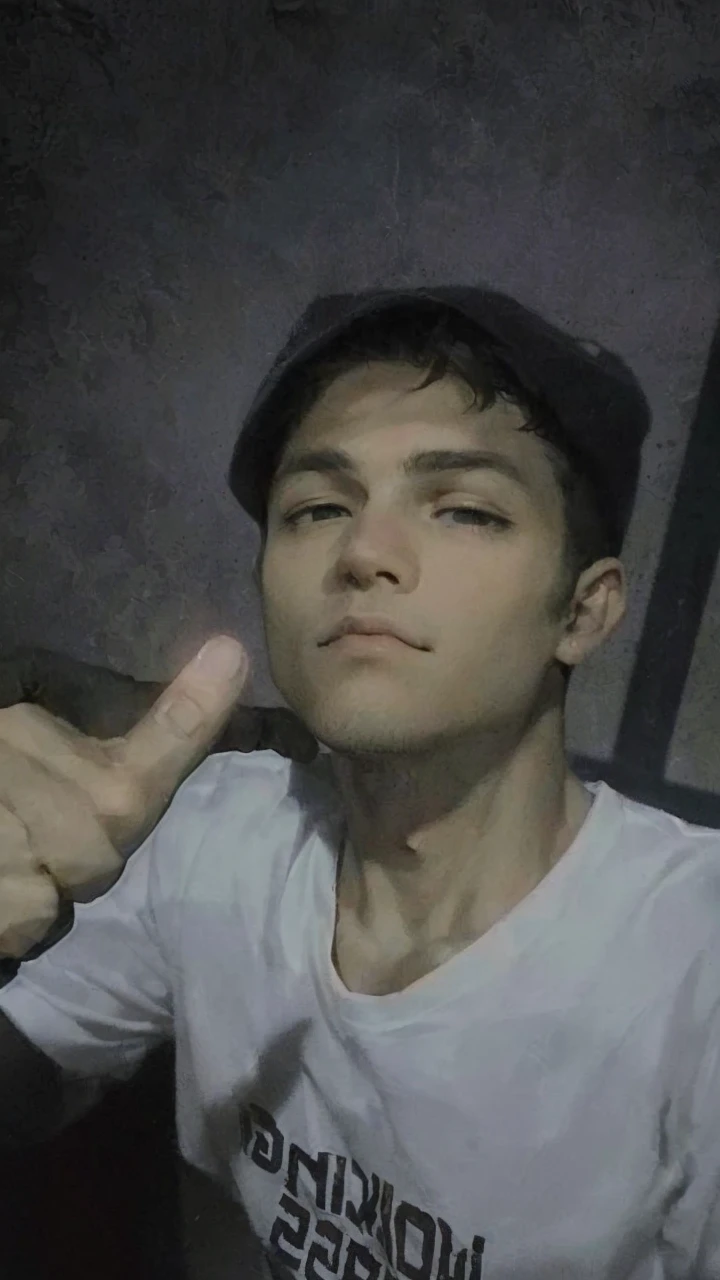 (masterpiece; best quality: 1.2), (finely detailed eyes: 1.3), ((25 year old man)), ((solo)), (black eyes: 1.4), (body; wiry, fit, masculine: 1.3), (short brown hair: 1.3), (beautiful and clear background: 1.2), ((depth of field)), (equipment: spec ops full black tactical combat-ready gear + black gloves + black cap + holstered gun + pouches: 1.3), (anime illustration: 1.2), (background composition; military base office: 1.1), (extremely fine and handsome: 1.1), (shot composition; standing + centered on torso + close-up: 1.5), (expression; calm, stoic: 1.2)
