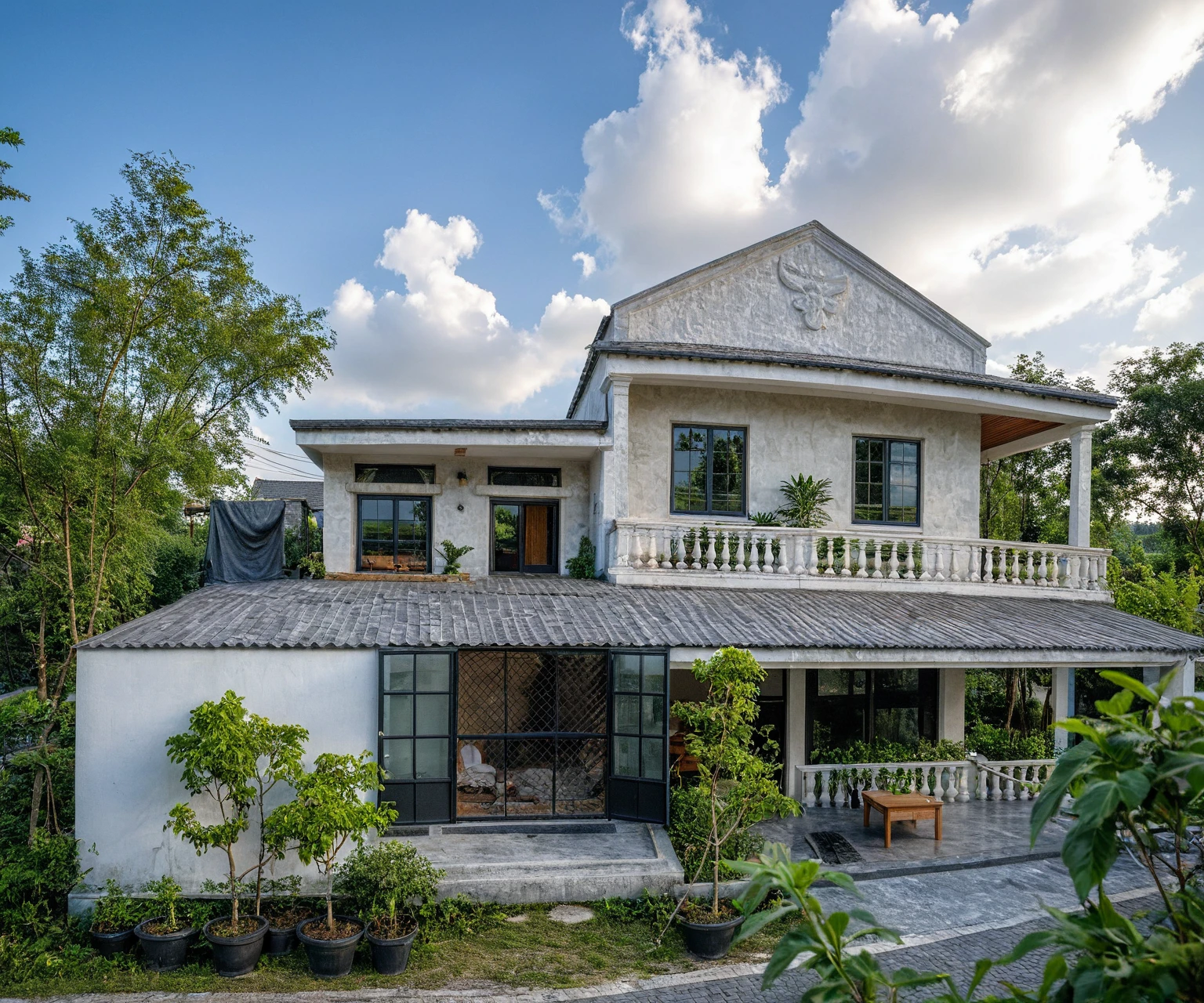 Masterpiece, high quality, best quality, authentic, super detail, outdoors, onestoreyvillaXL, aiaigroup, house style modern on the street ,stairs, white wall ,road,pavement, grass, trees, sky, cloud, (daylight:1.1)