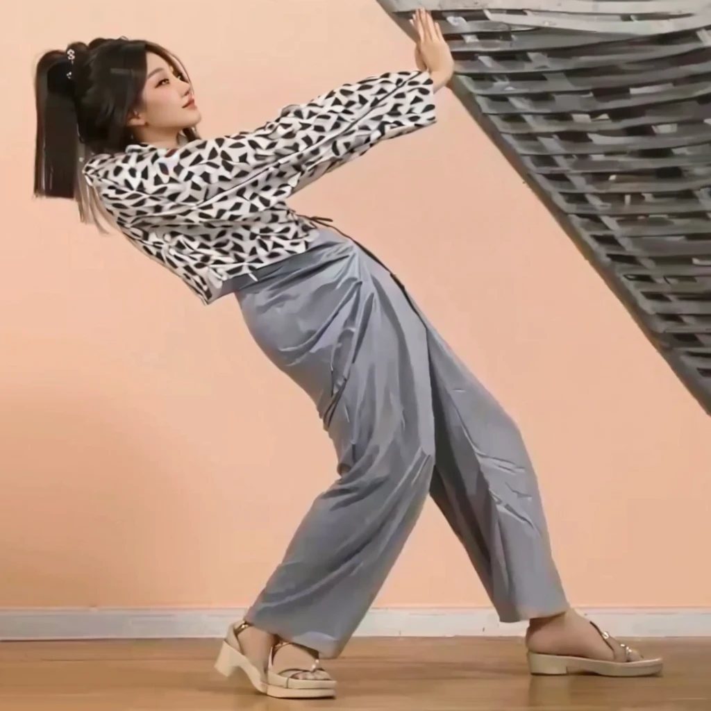 Japanese Girl thin body wearing a white short-sleeved t-shirt sees the ghost and pees her light blue loose pajama pants until his pants are wet pants in fright.