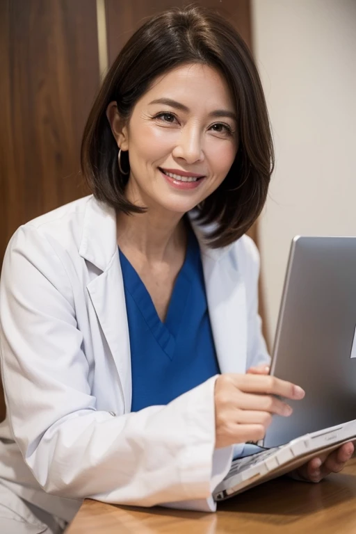 A smiling woman in her 50s wearing a doctor&#39;s gown