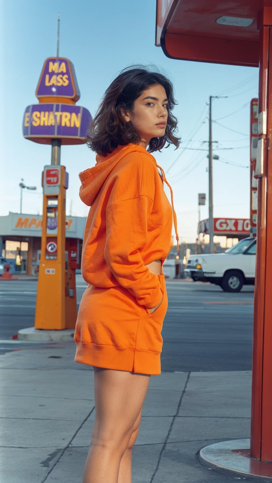 photo cinematic photograph long shot portraits by Wes Anderson, cute 23 yo girl ,fokus, bokeh ,wear ((orange oversized_hoodie)), wear ((purple tennis skirt)),looking front,Best Quality,Masterpiece,Ultra High Resolution,(Realisticity:1.4),Original Photo, 1Girl, light leak,ultra high resolution,UHD,beautiful, (black bob hair), almond eye, no makeup, in front of ((80's colorful los angles gas station)), (realistic:1.2), (surreal:1.3), (very detailed:1.1), ((masterpiece)),summer, blue sky, palm trees,sunny, los angles vibes,film camera, 800mm lens,style of Philip Lorca diCorcia