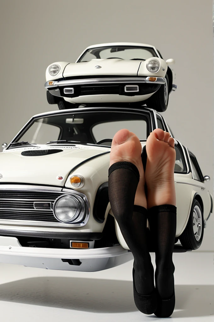 huge female foot in stockings stands on top of miniature car, white room