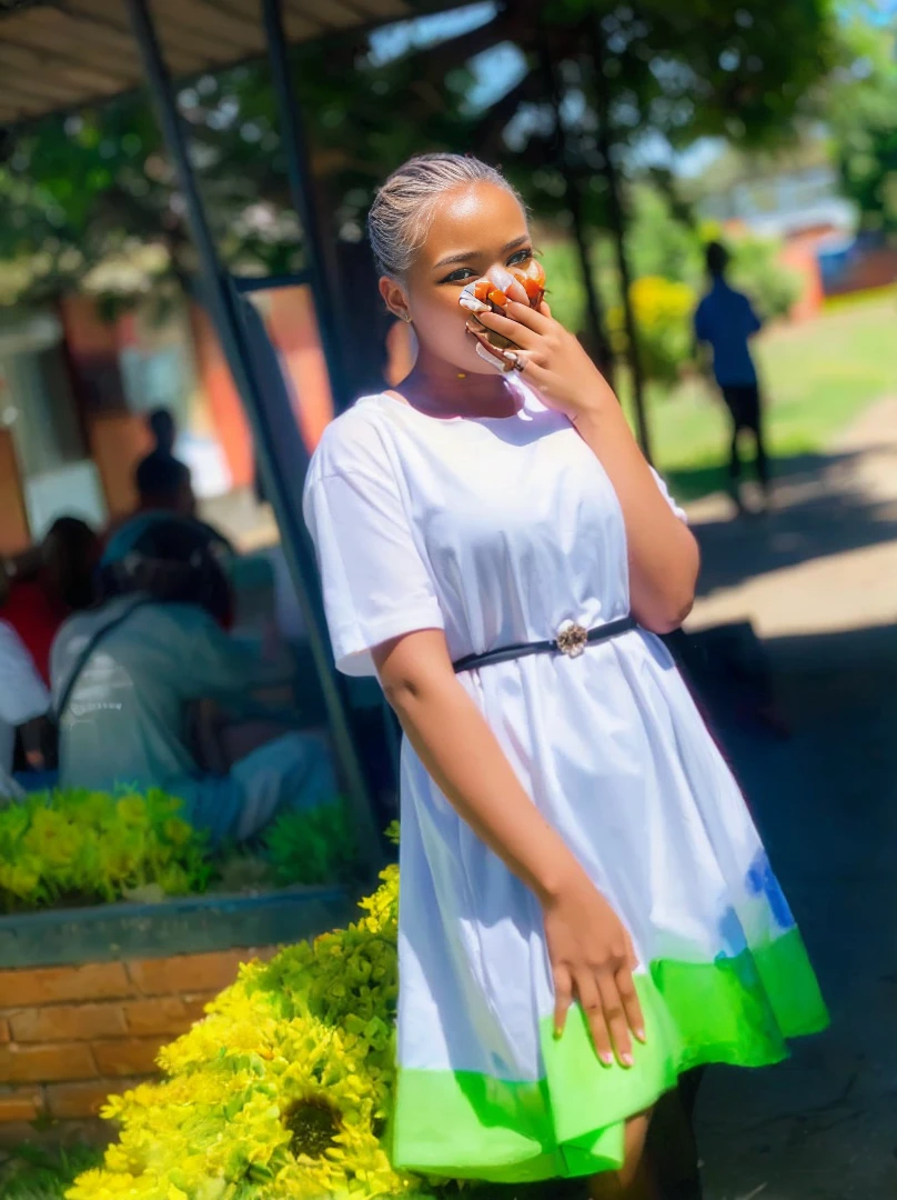 (8K, RAW photo:1.2),1 girl,(short hair:1.31),(8K, RAW photo:1.2),1 girl,((masterpiece, Highest_quality)), 1 girl, (realism:1.4), colorful flower theme:1.3), random colorful hair style, (random colorful flower eccentric clothed), (colorful flower art work to background:1.6)