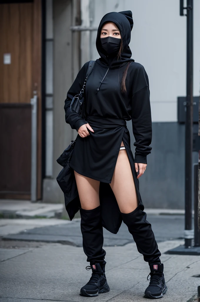 Full-body photo of a female ninja in black clothing and a black hood