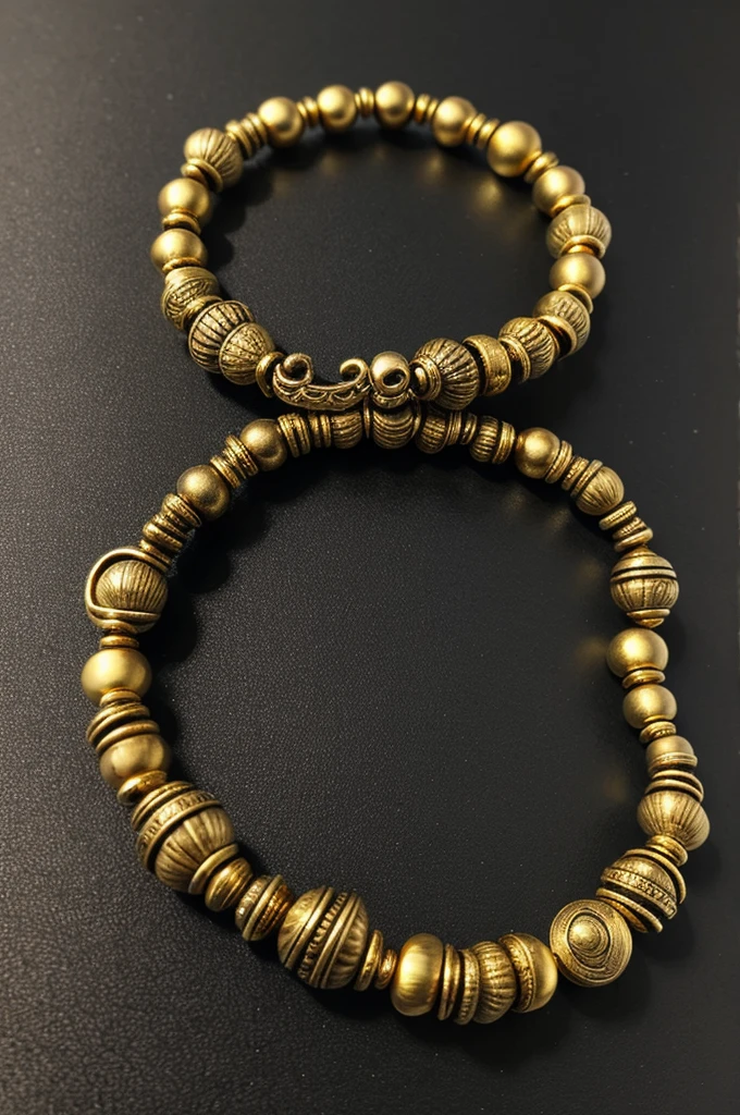 Ancient bracelet of indigenous peoples. Made with snails or small shells of different shapes and colors and some gold beads