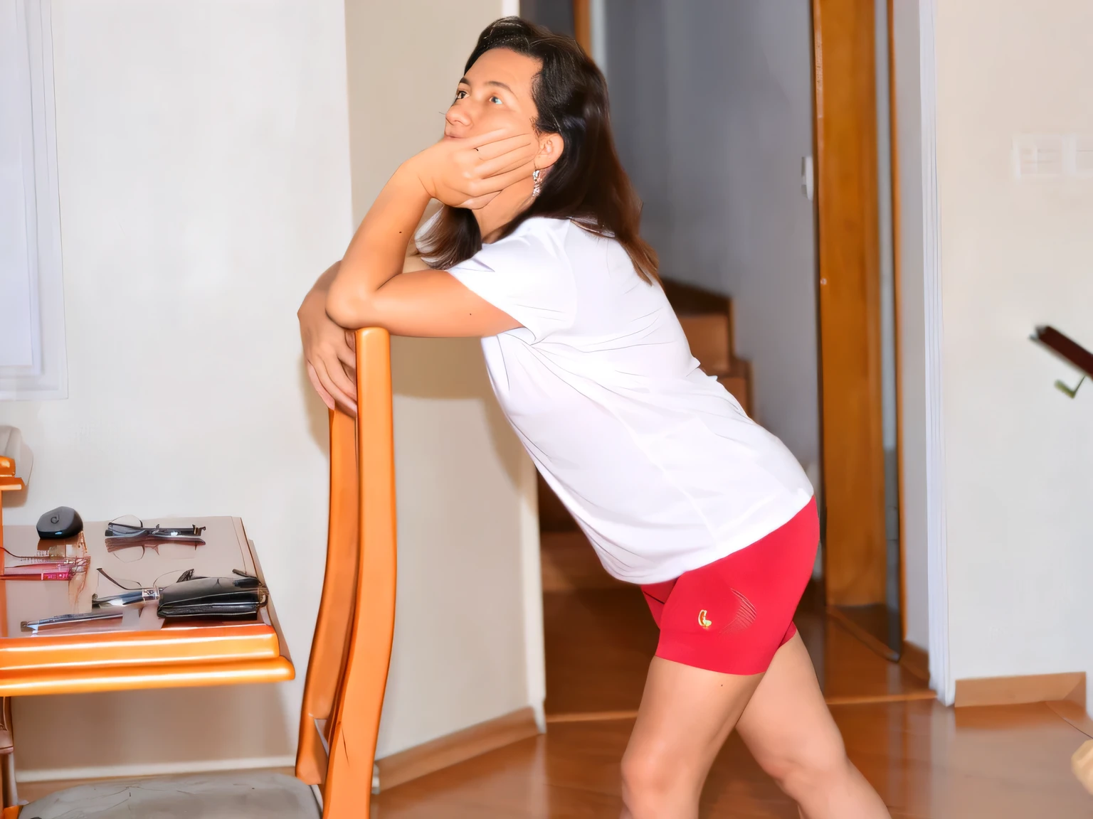 there is a woman standing in a living room with a chair, distorted pose, in an action pose, bend over posture, bent over posture, squatting pose, side pose, scary pose, smoking with squat down pose, bent - over posture, doing a sassy pose, forward facing pose, waist reaching ponytail, bending over, frantic dancing pose, desperate pose