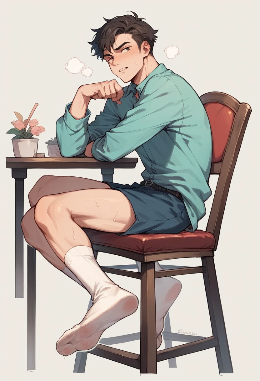 Boy scrunching his sweaty soles in white socks sitting on chair