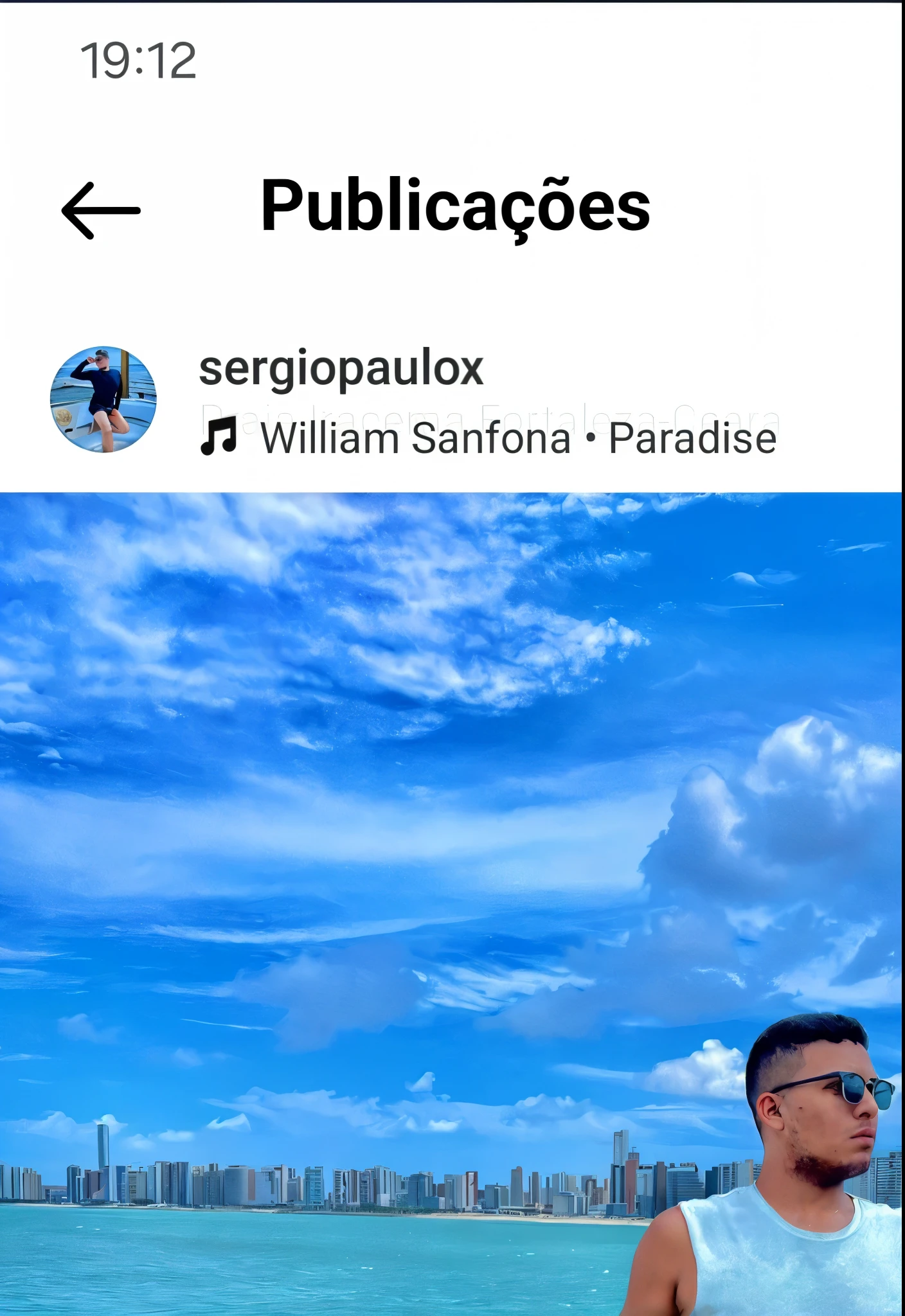 remove the boy from the photo, leaving only the landscape with the enlarged sky
