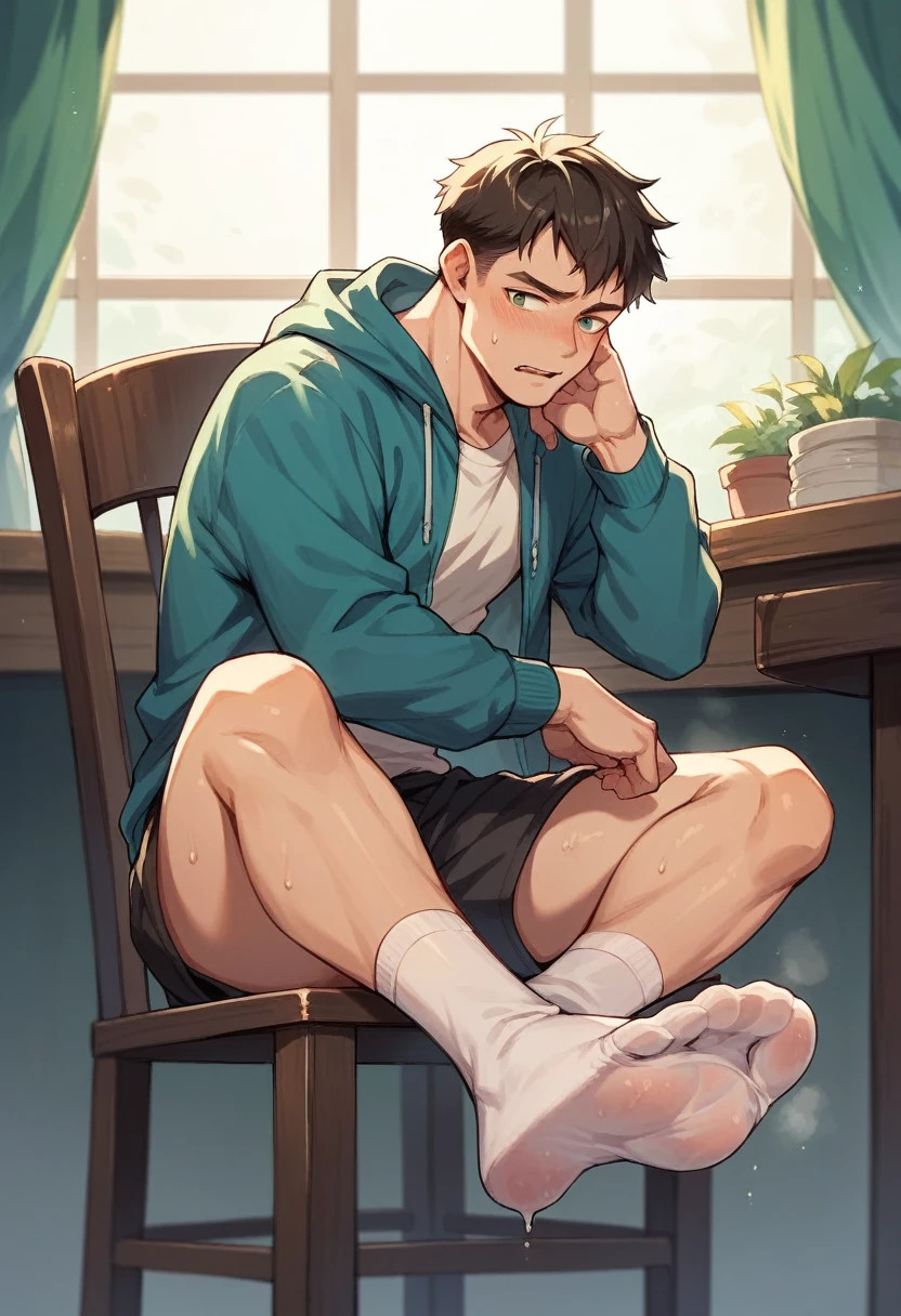 Boy scrunching his sweaty soles in white socks sitting on chair