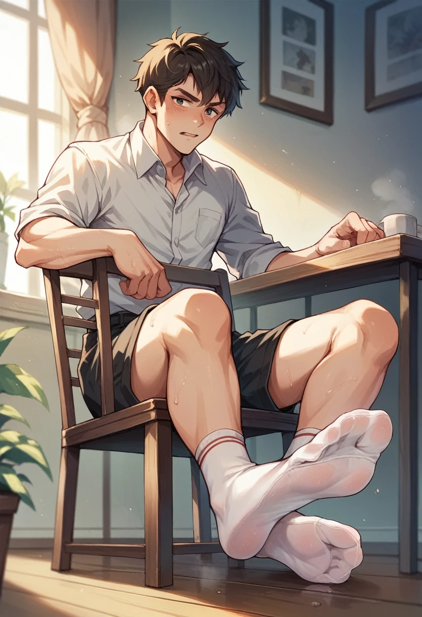 Boy feet scrunching his sweaty soles in white socks sitting on chair