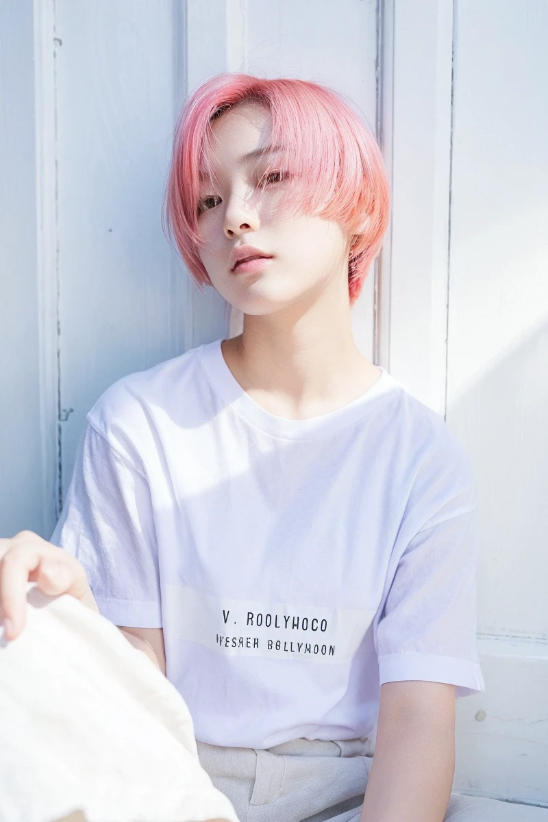18 year old Japanese girl, very cute fashion model. Her hair color is dyed to match the fashion, and her hairstyle is Short. The photo style is cinematic, with soft natural lighting to enhance the natural look. --ar 2:3 --style raw --v 6.0