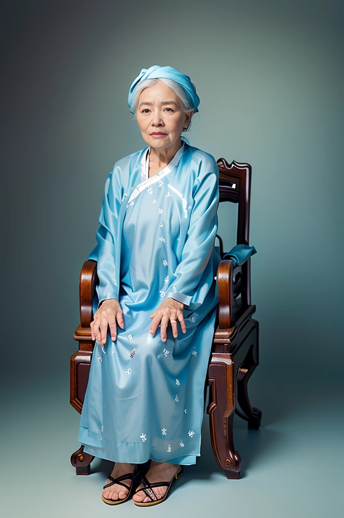 Highly realistic photo, ((masterpiece), (best quality), (raw photo), (photorealistic:1.4), The photo depicts an elderly vietnamese old woman sitting on a chair. She is wearing a dark-colored traditional vietnam aodai and a black headscarf. She is wearing flip-flops and has her hands resting on her lap. The elderly woman has a kind appearance, a thin face with many wrinkles, and white hair. The background of the photo is a gradient from deep blue to light blue. The chair she is sitting on has a classic design with intricate patterns) , photo taken by Sony A7IV
