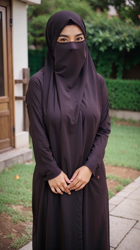 A beautiful Asian girl in a long hijab with tight and clearly visible breasts, With dark colored clothes, Is hugging herself , and good quality images