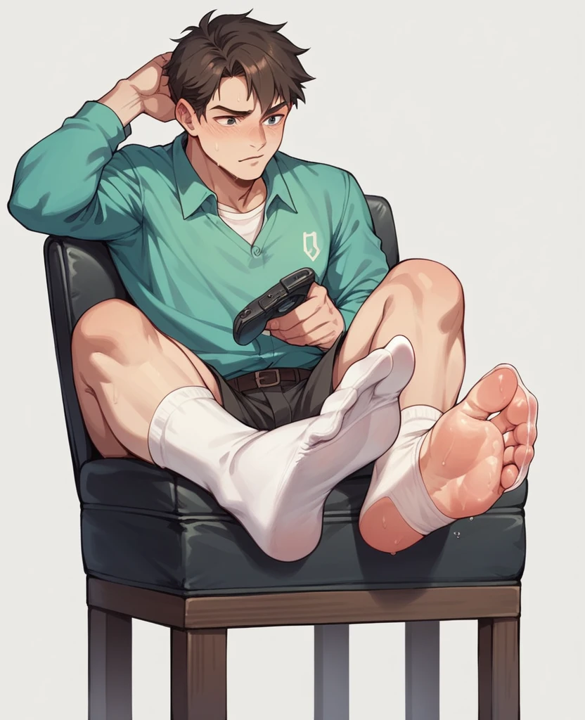 Boy showing the soles of his feet while scrunching his sweaty soles in white socks sitting on chair while his feet under it facing to the camera with shoeplay