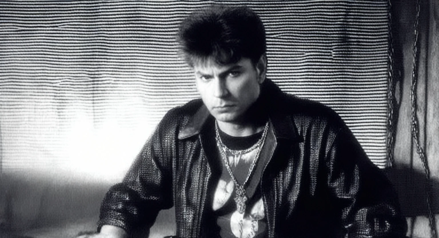 arafed man sitting on a couch with a guitar in his lap, gopnik in a black leather jacket, still from a fantasy movie, scene from the film, in the film excalibur 1 9 8 0, scene from a 1 9 7 3 film, kramskoi 4 k, scene from a movie, trakovsky greatest scene, still image from the movie, still from the movie