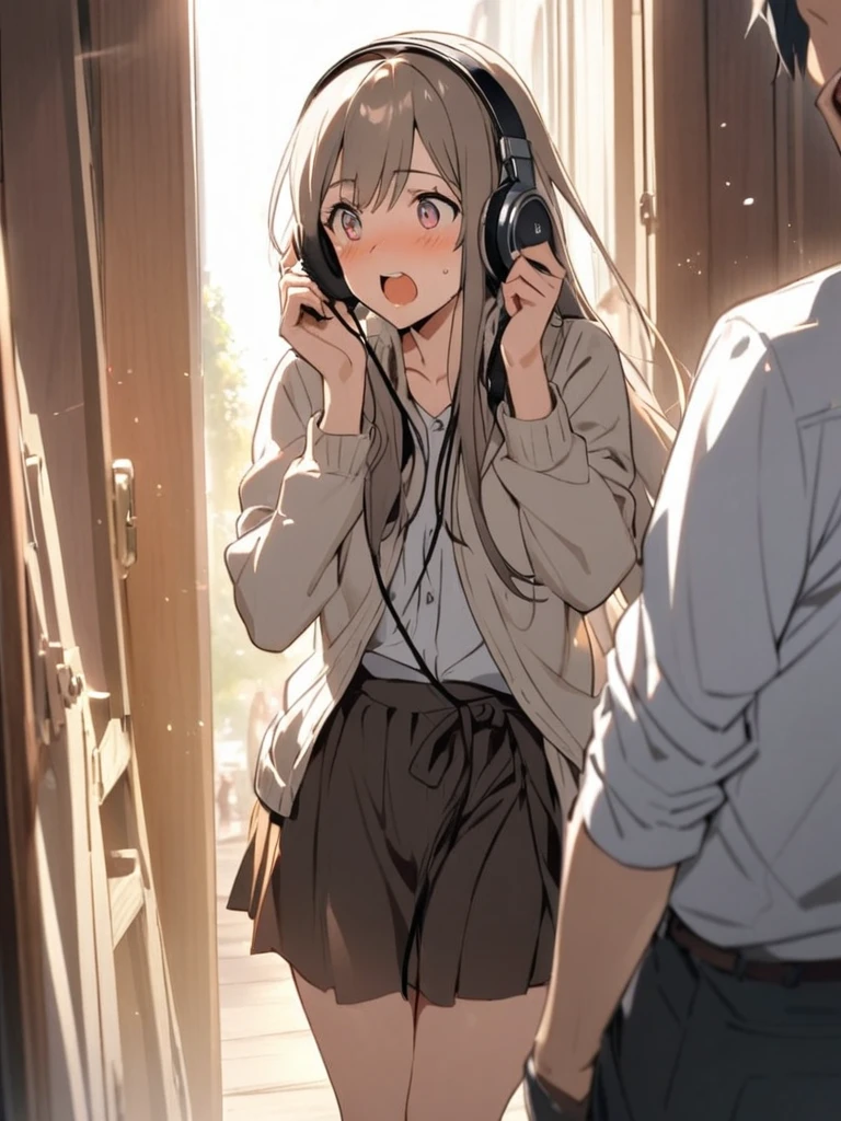 A young man putting headphones on a woman while she gets excited.