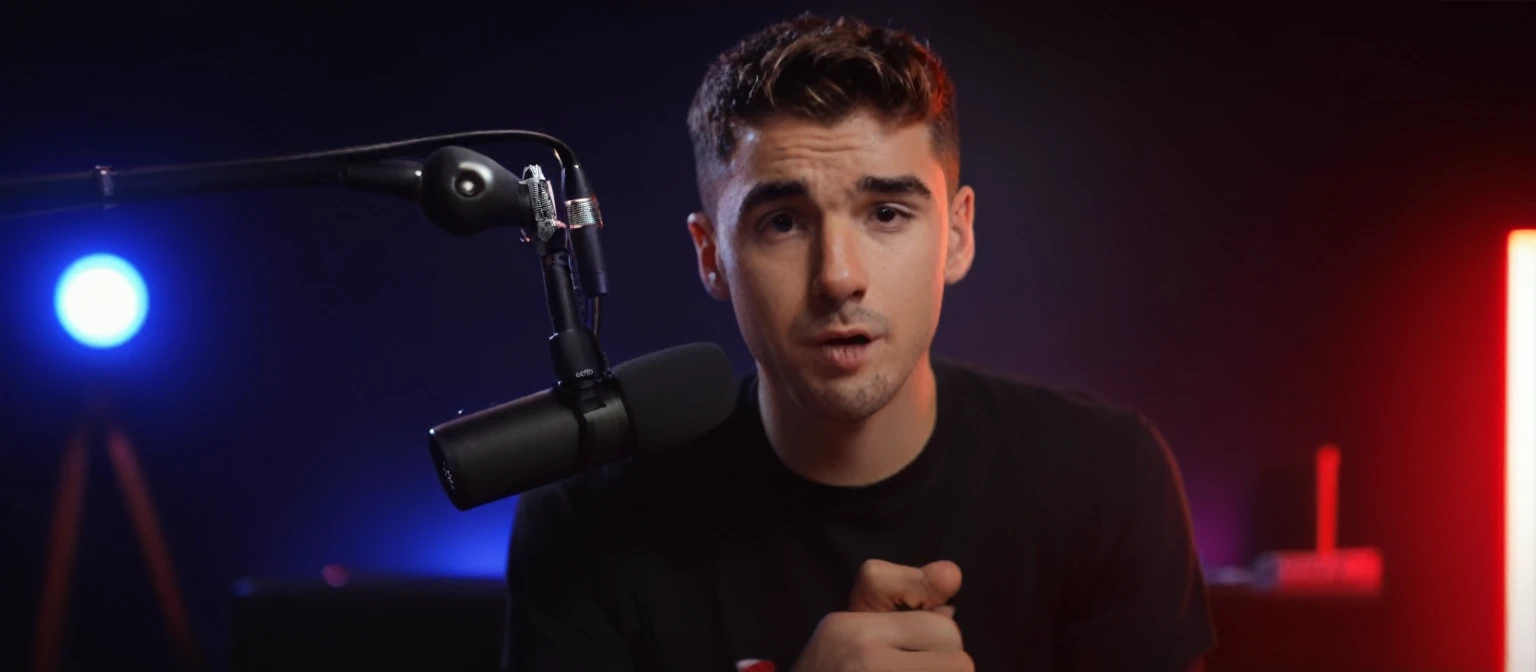 arafed man in a black shirt is talking into a microphone, youtube video screenshot, sitting in front of a microphone, inspired by John Luke, h3h3, twitch streamer, f 1 driver charles leclerc, liam brazier and nielly, irish youtuber, youtuber, holding a microphone, against dark background, rapping into microphone, detailed portrait shot