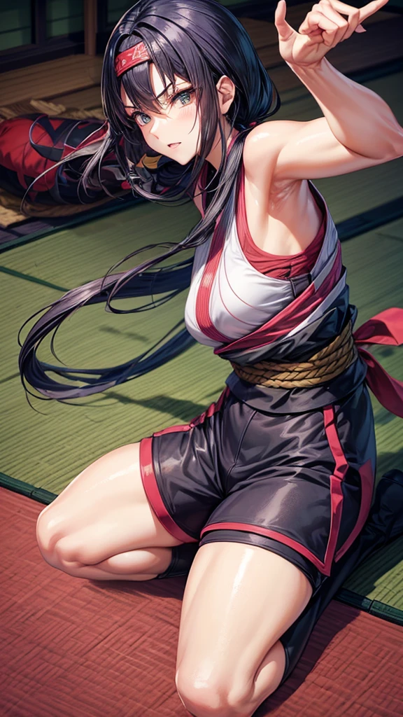 Female ninja throwing shuriken on a tatami mat