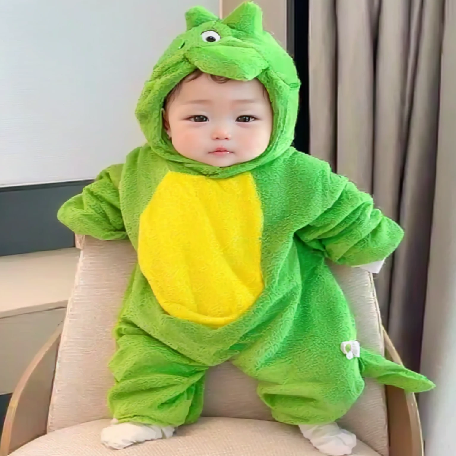 there is a  in a green and yellow Costumes sitting on a chair, cute Cute, Cute, Cute小龍, Litte, 又Cute and可愛, Cute and cute, Cutest, cute and Cute, Very cute, cute colorful Cute, Very cute, Costumes, Velvet dragon, toddler, Vy cute, high quality Costumes, Dragon pattern suit, Cute and, Memes