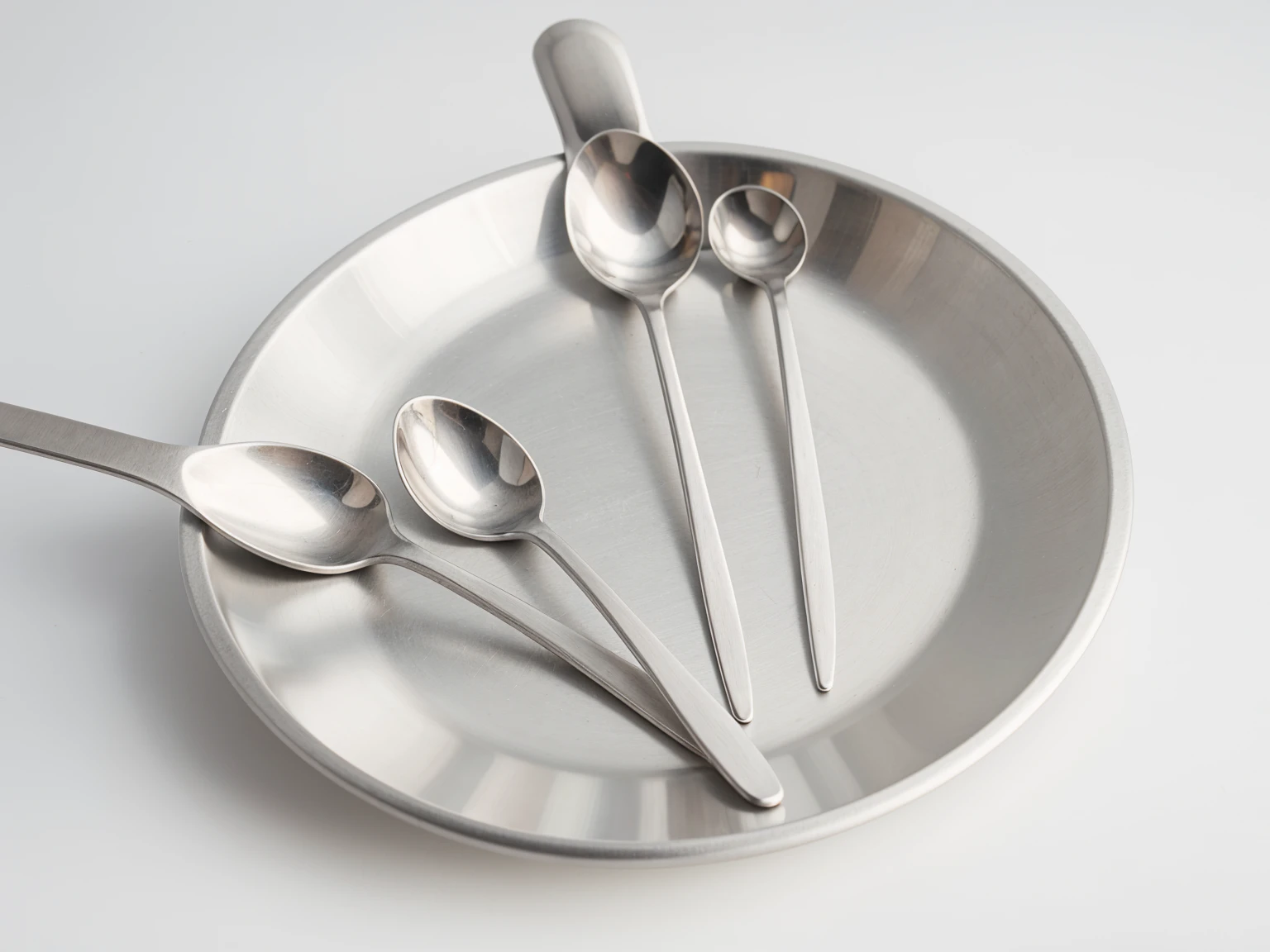 1 spoon aluminum, white background