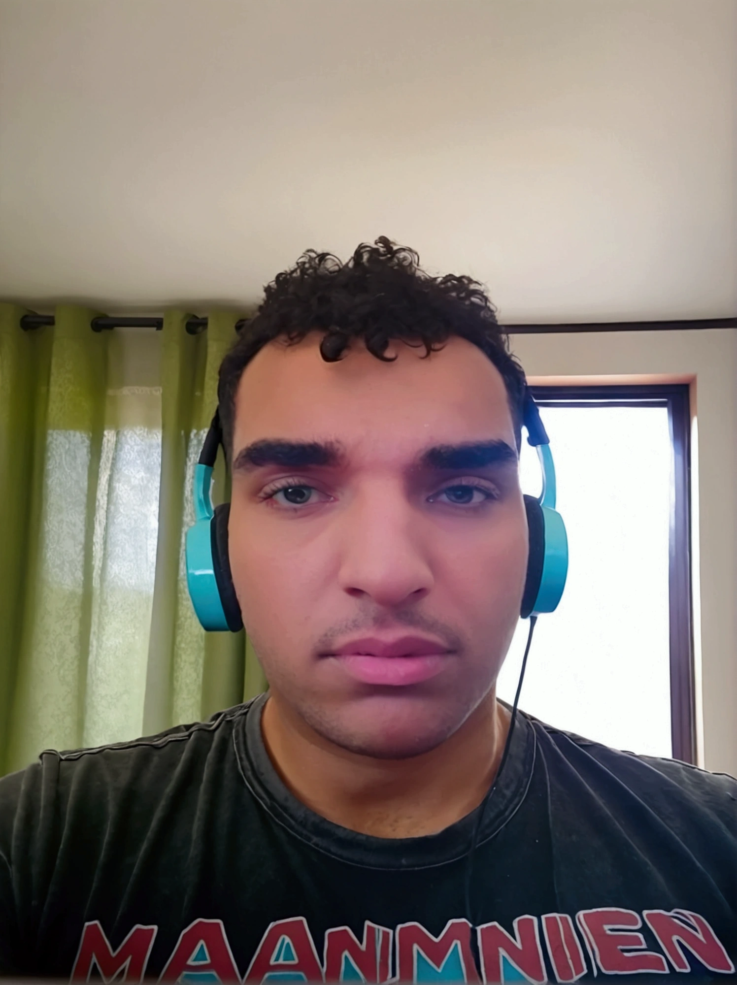 Youtuber headphones in front of computer