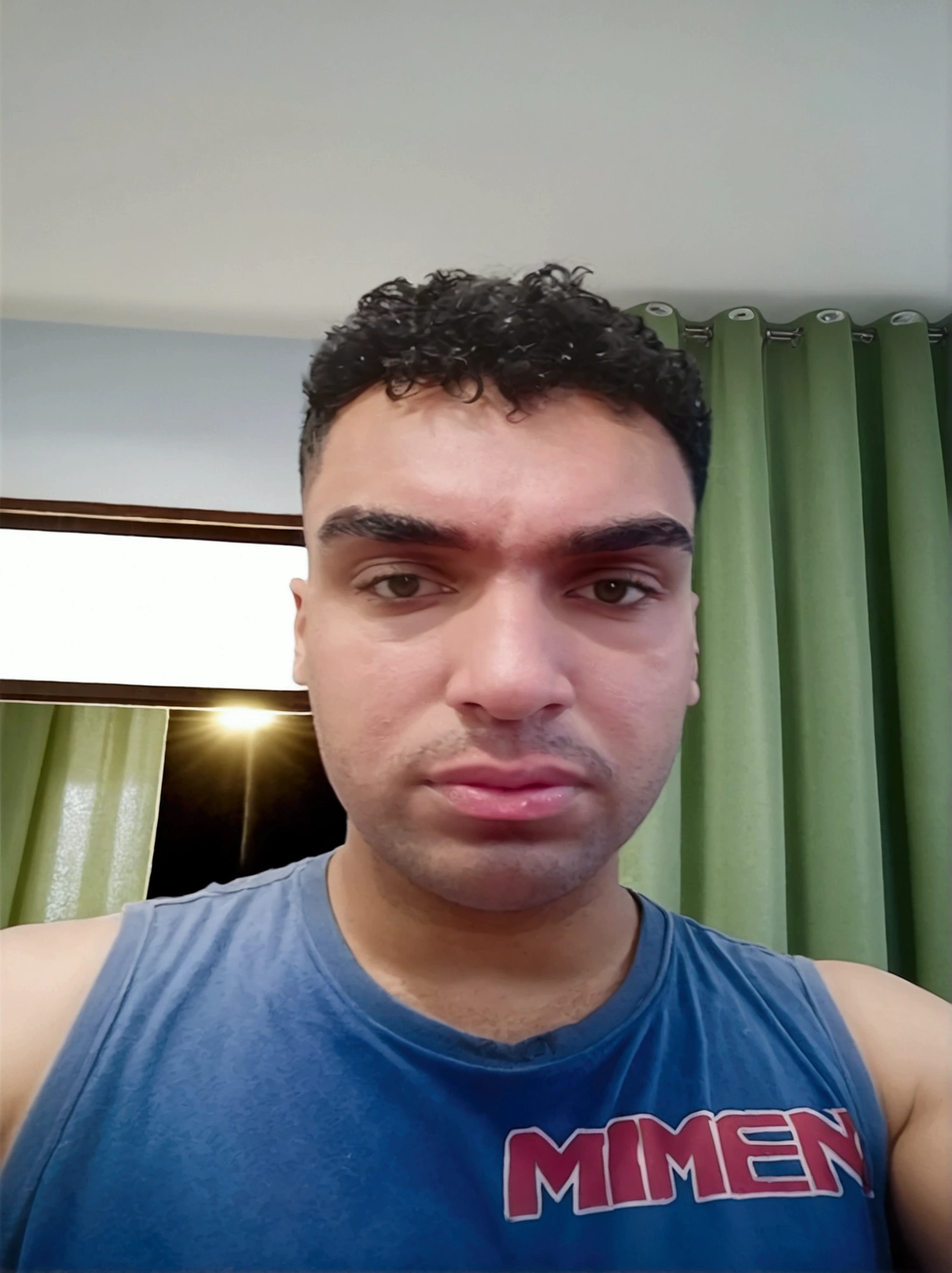 Youtuber headphones in front of computer