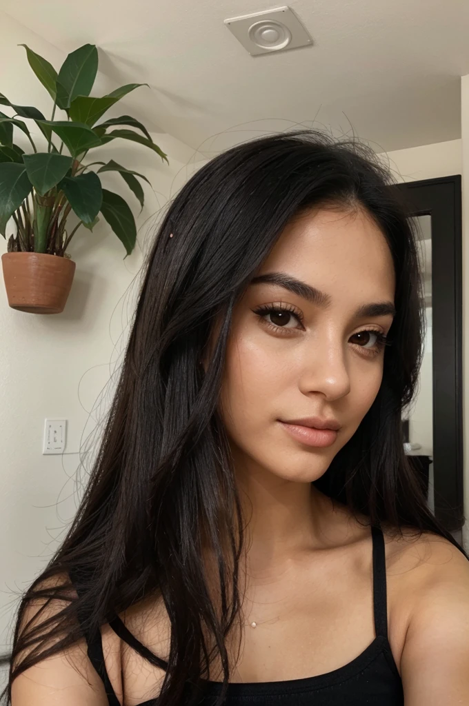 a magnificent young woman in her twenties, with Latino features. She has long, straight black hair that falls loosely over her shoulders. Her face has soft and balanced contours. She has large, well-defined dark brown eyes with long, thick eyelashes and well-arched black eyebrows. His nose is straight and slightly refined, proportionate to his face. Her lips are full and defined, with a natural color, and they are closed, contributing to her neutral expression. Her skin is matte, smooth and without visible imperfections. She is wearing a black t-shirt. She holds a small credit card clearly visible in her right hand. She takes a selfie with her left hand
