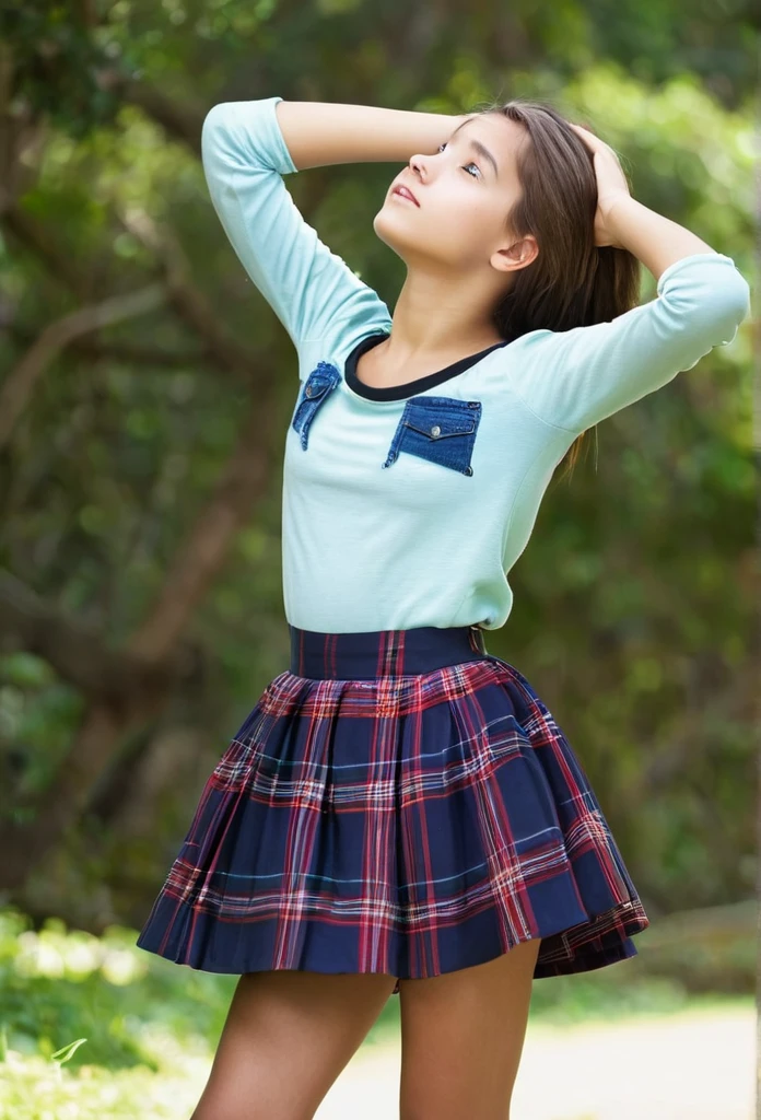 15 year old teenager in a short skirt with her hands on her head looking up