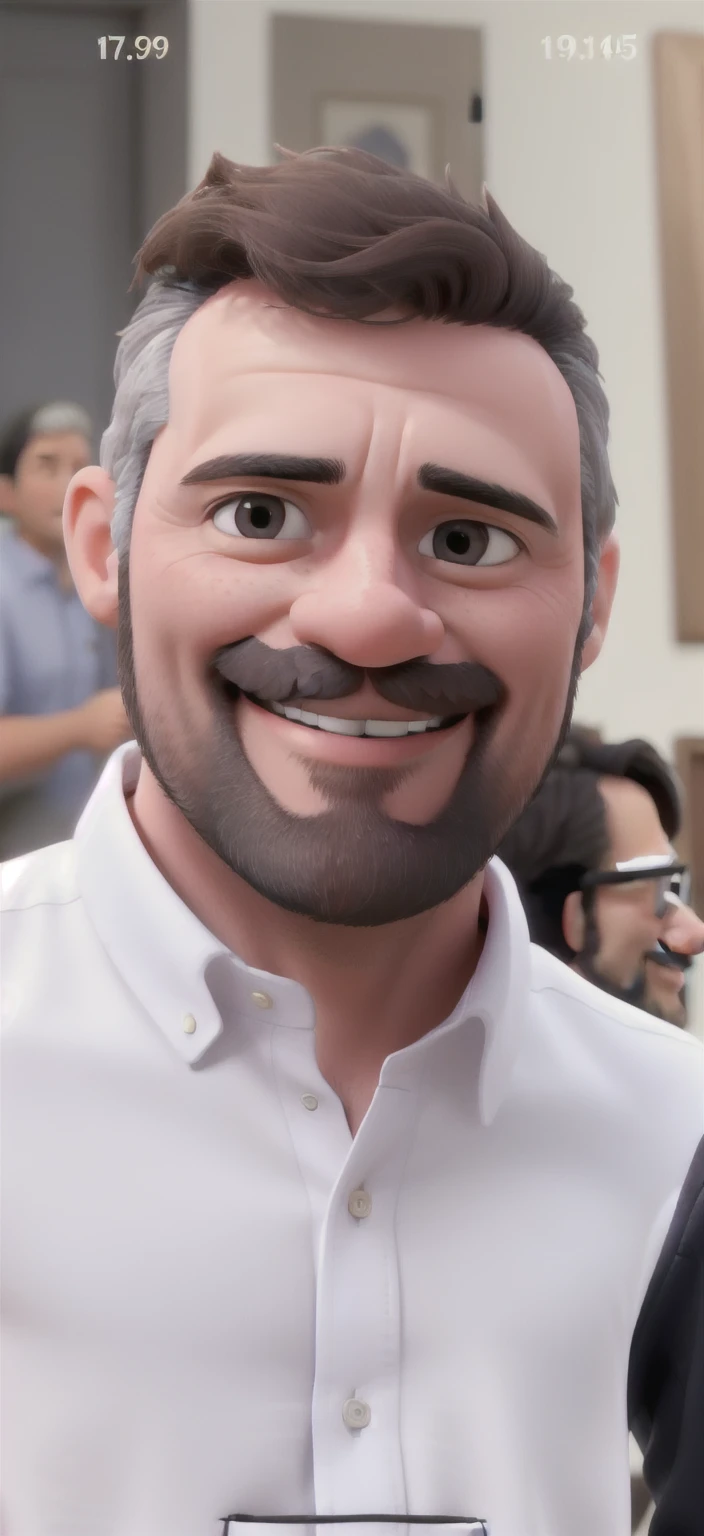 Man poses for photo. He wears a very light pink shirt, executive appearance. He has a sparse black beard with a few gray hairs.. He looks good and smiles in the photo.