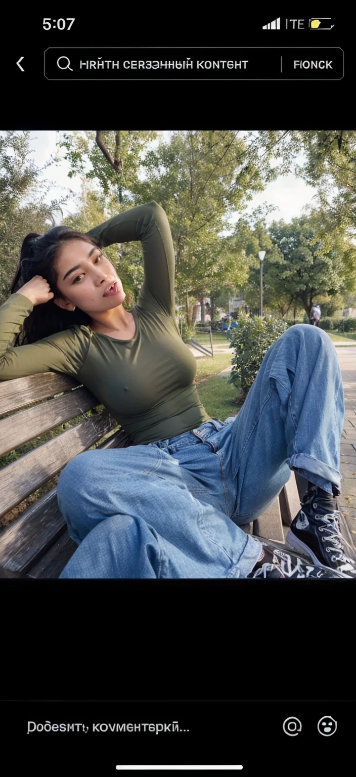 Central asian girl in very tight olive green long sleeve t-shirt without any bra underneath , oversize jeans , on public seat , sexy face , wet mouth , wet clothes 