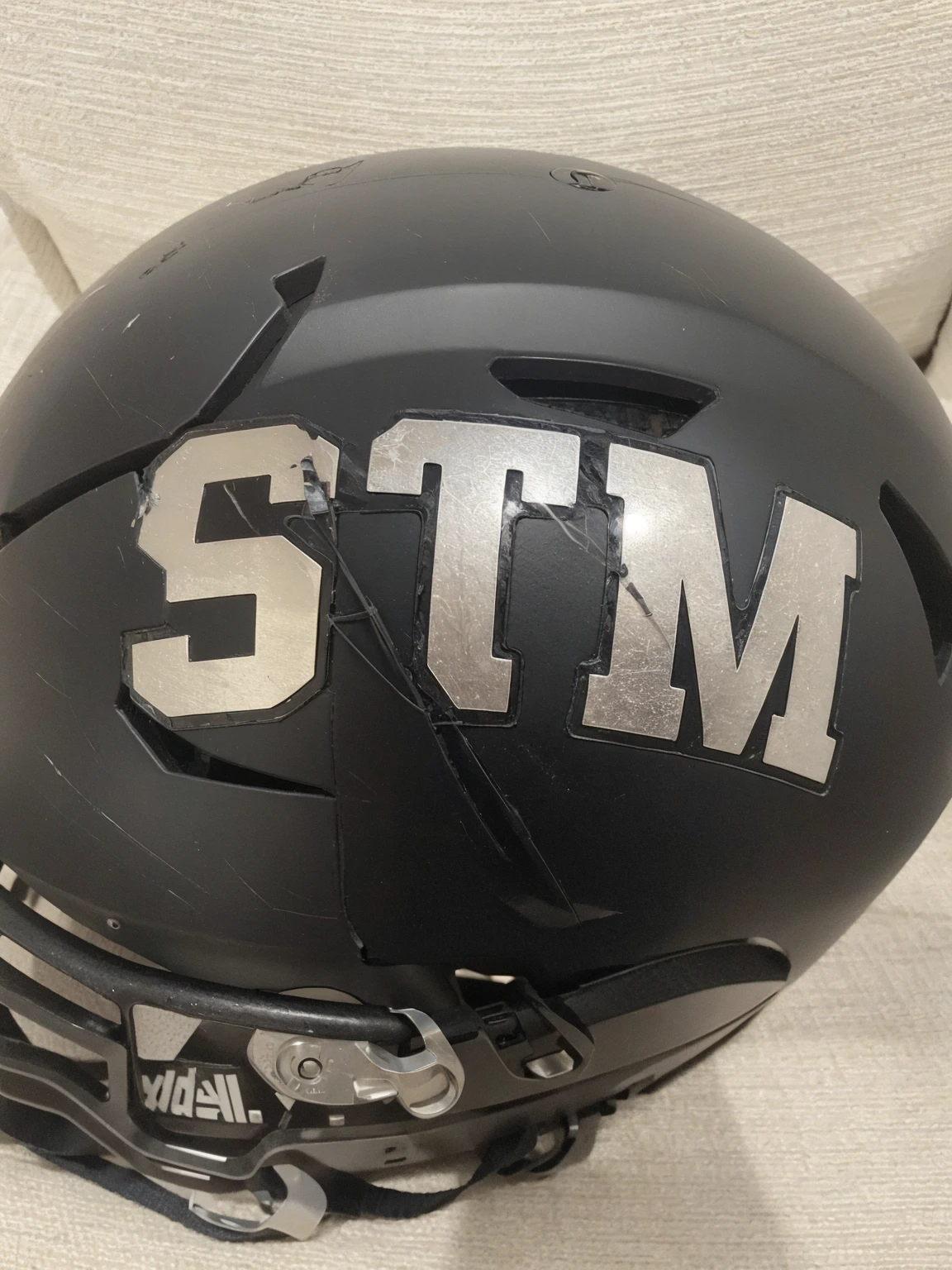 Remove the helmet and leave the logo